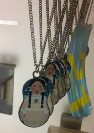 Illustration for article titled Forever 21 Gets In On Cultural Insensitivity Trend With "Oriental Girl" Necklaces
